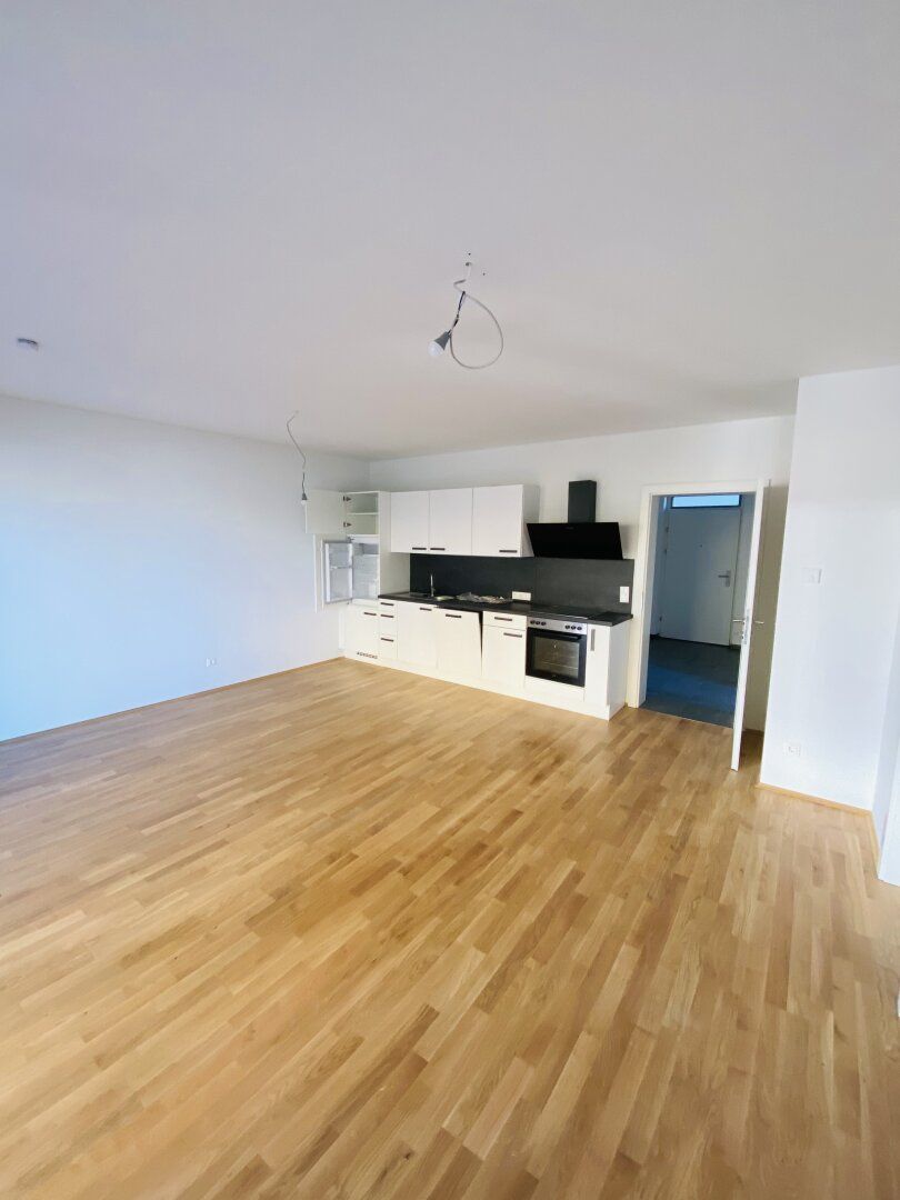 TRAUMHAFTE 3-Zimmer-Neubauwohnung mit herrlichem Balkon, Morgensonne und Tiefgaragenparkplatz