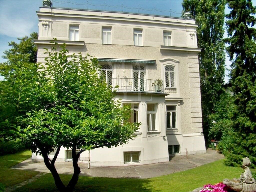 Sehr schöne Wohnung in Cottage-Villa (mit Gartennutzung)