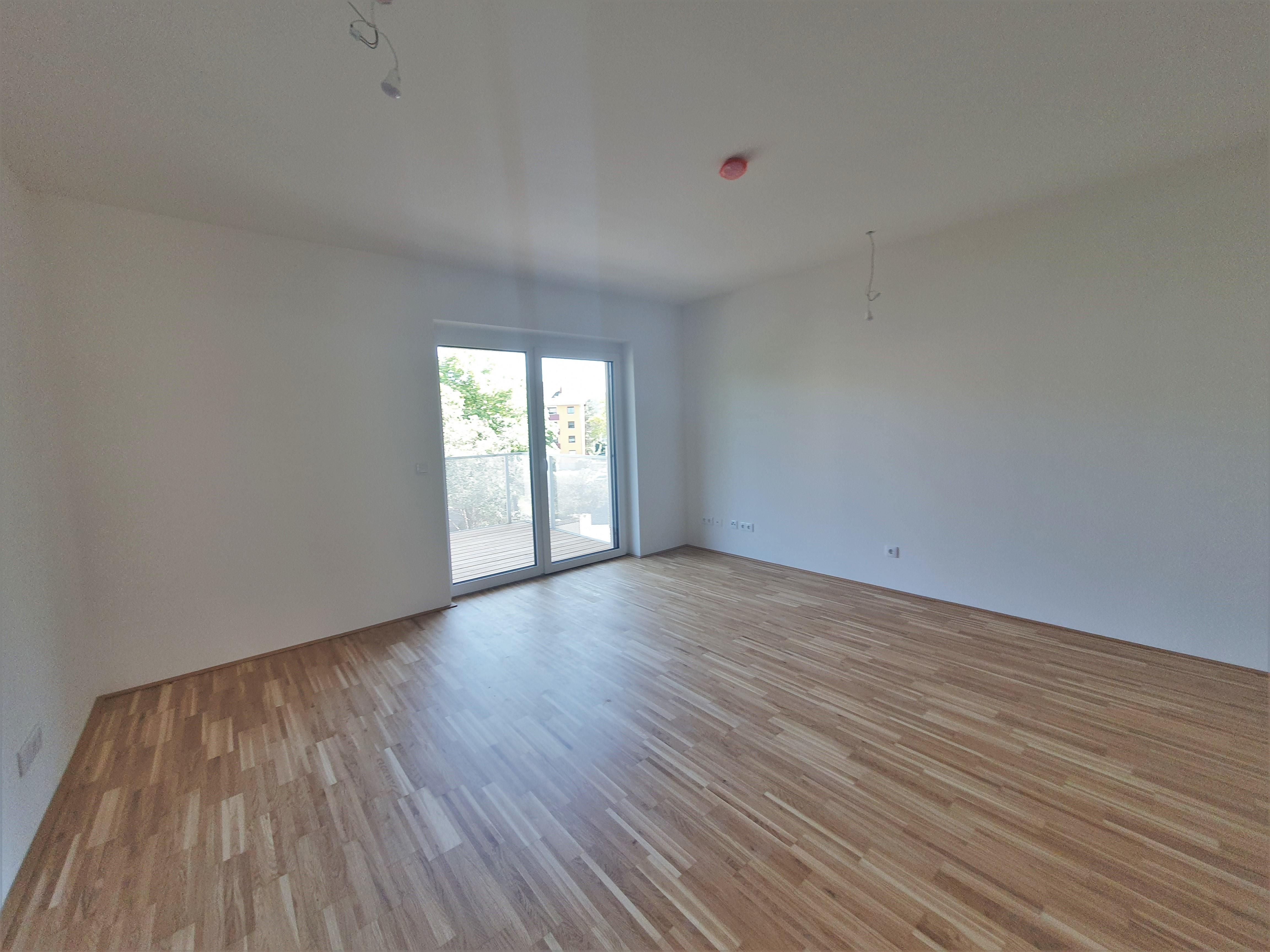 Geförderte Neubauwohnung mit Balkon in sonniger Lage
