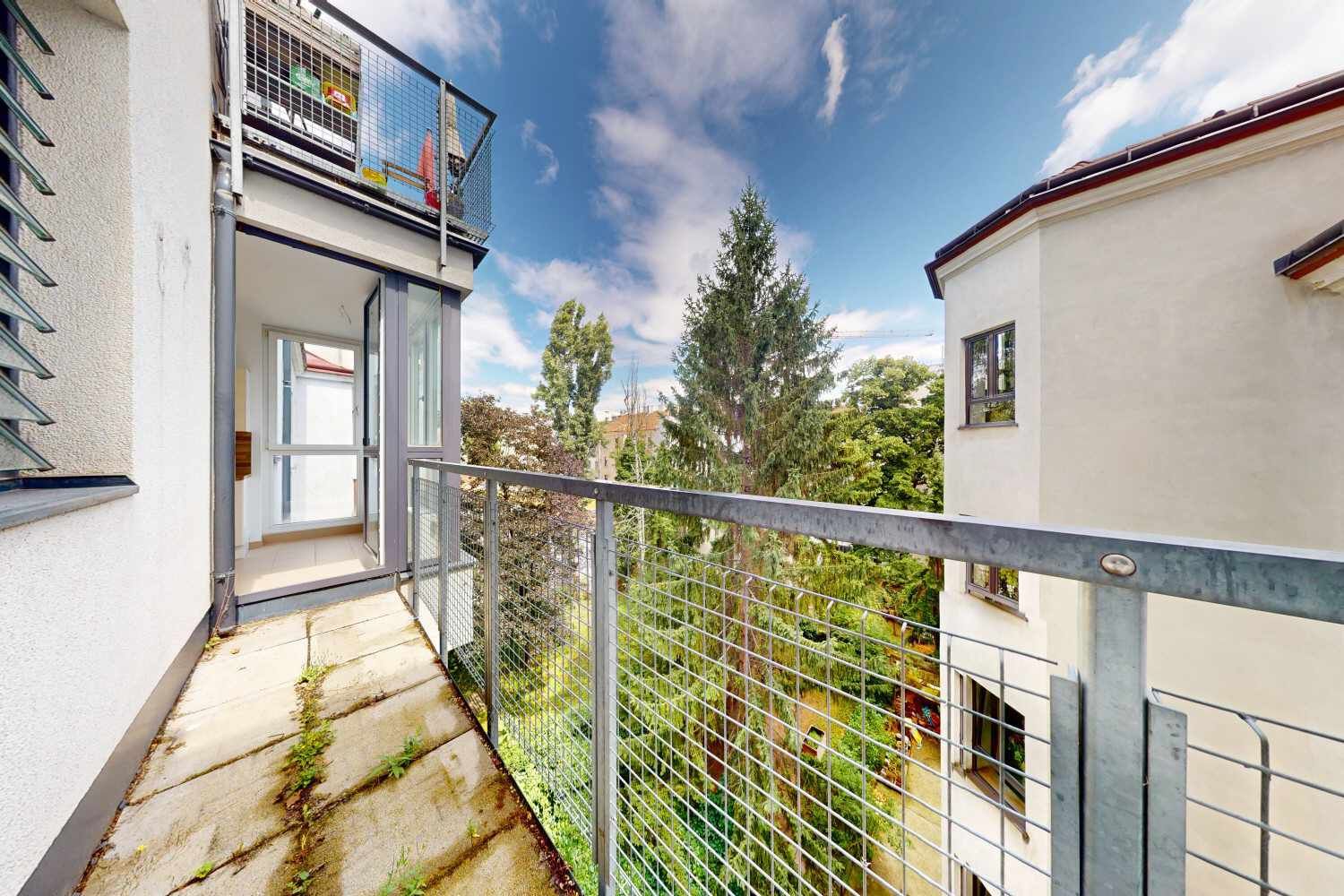 Historischer Charme trifft moderne Wohnqualität -  3-Zimmer-Wohnung mit Innenhof-Terrasse