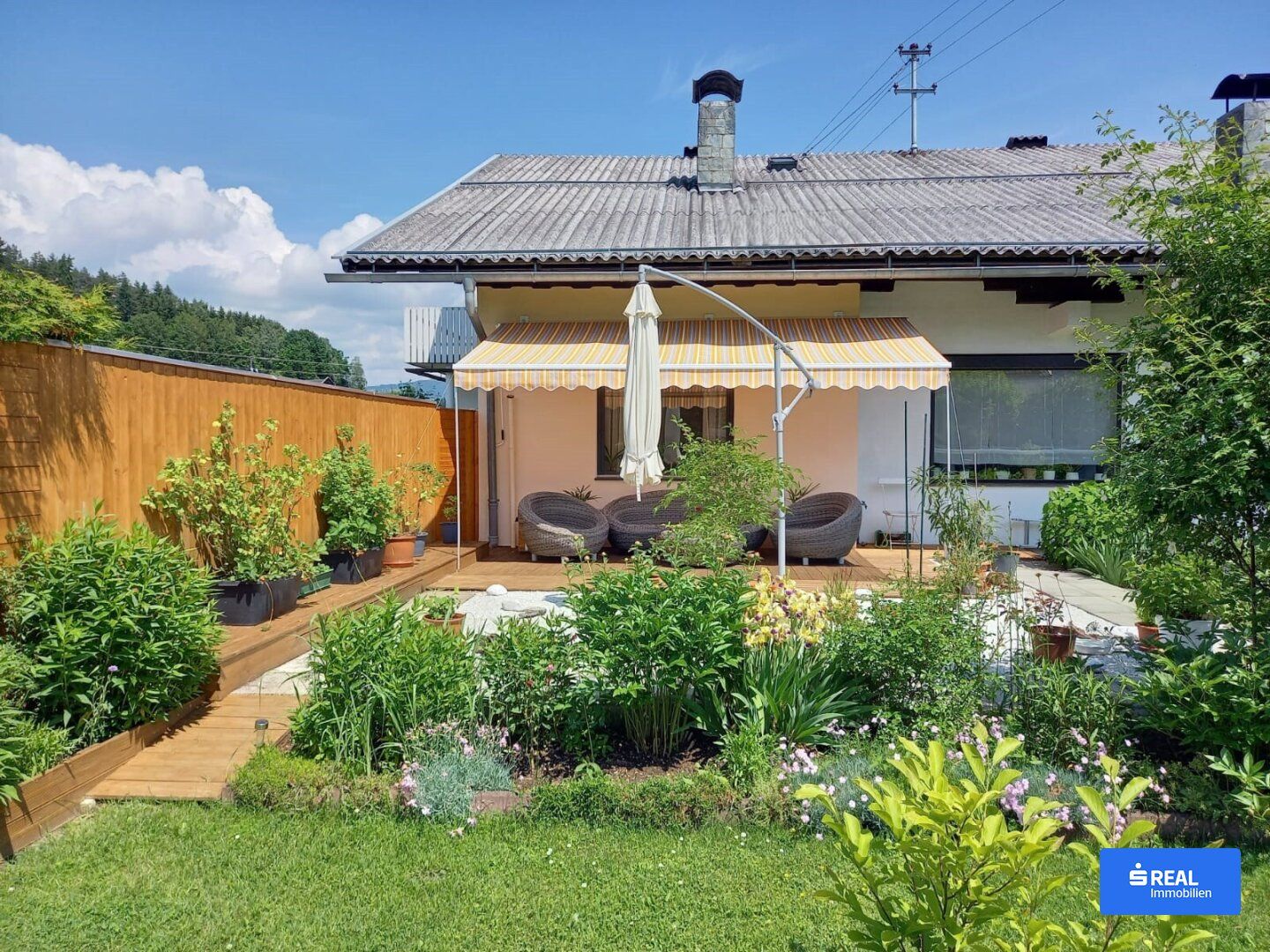 Großzügiges Familienhaus mit idyllischem Garten