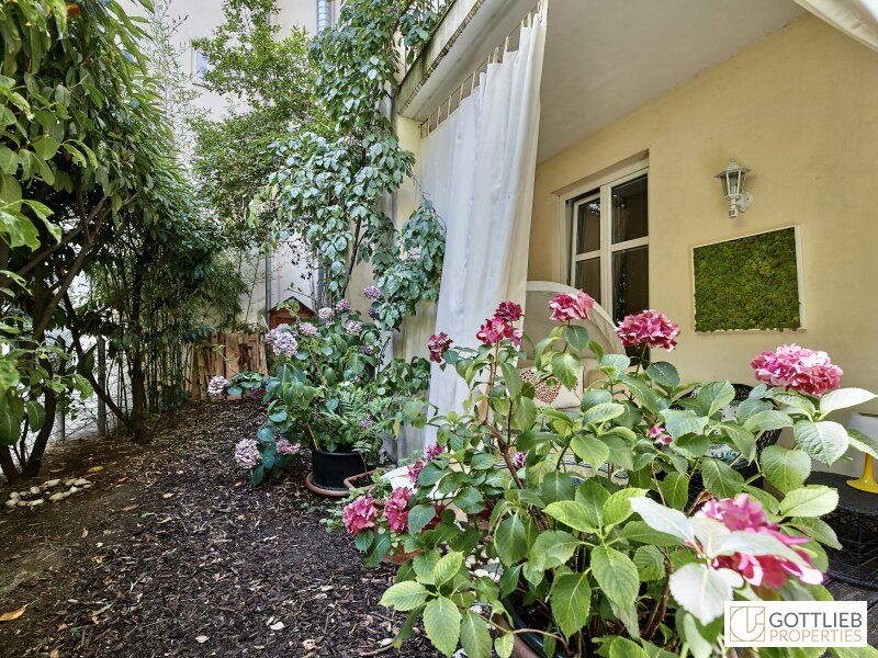 Bestlage Nähe Mariahilferstraße! Exquisite 6-Zimmer-Maisonette-Wohnung mit romantischem Eigengarten und Garagenplatz