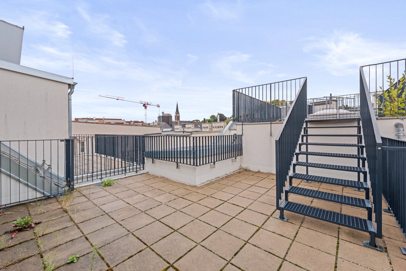Erstbezug - Atemberaubende Dachterrasse in den Innenhof!