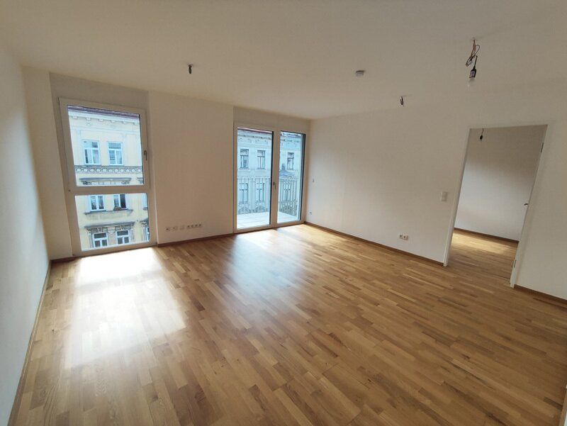 Modern wohnen in Meidling! Neubau 2-Zimmer-Erstbezug mit Balkon im 4. Liftstock - Top50