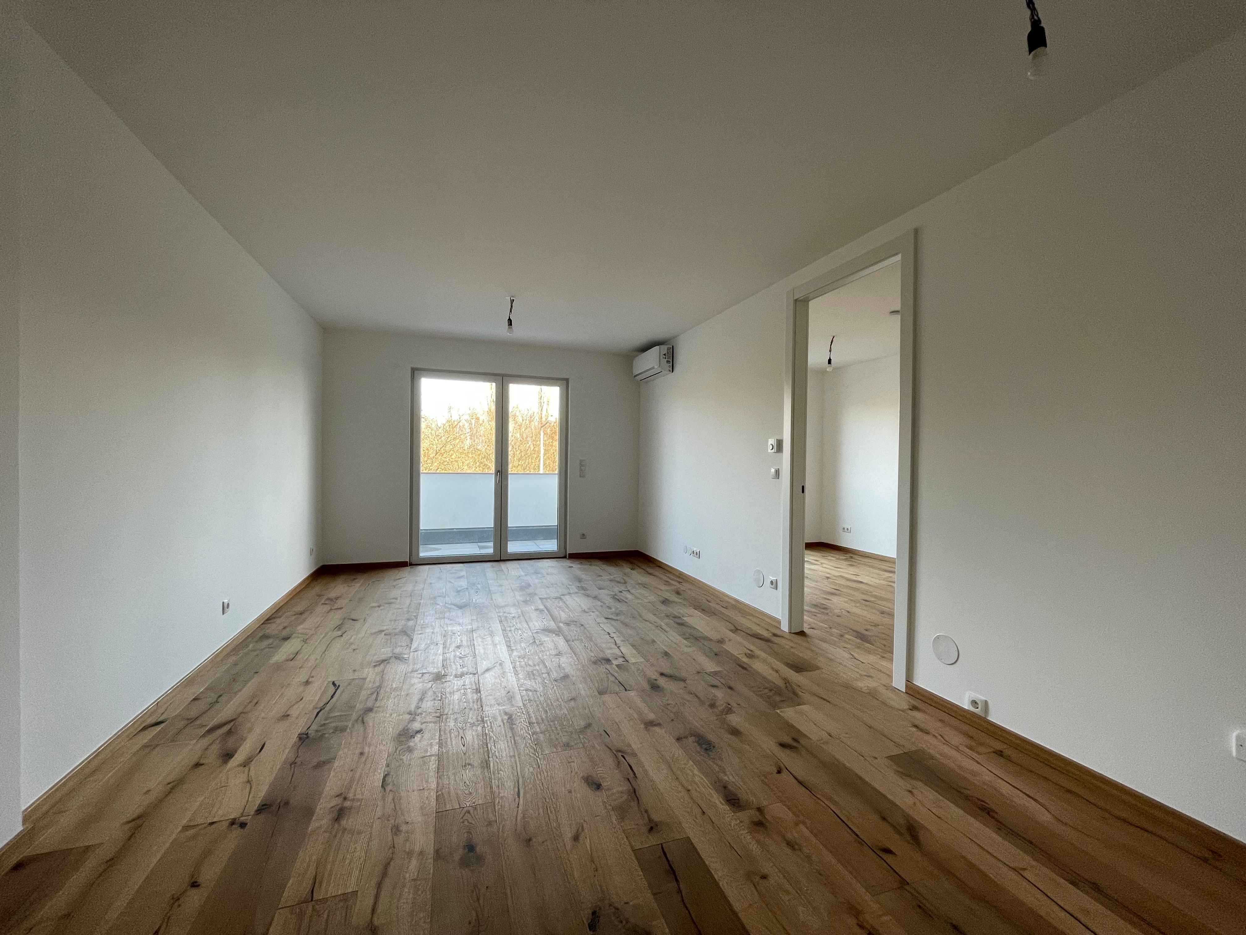 Dachgeschosswohnung mit Blick ins Grüne - stilvoll wohnen am Waldrand
