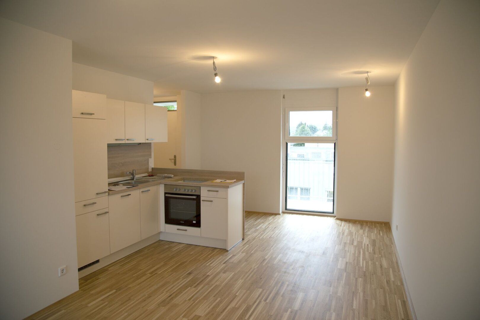 Dachgeschosswohnung mit traumhafter Terrasse und Tiefgaragenparkplatz in Liebenau