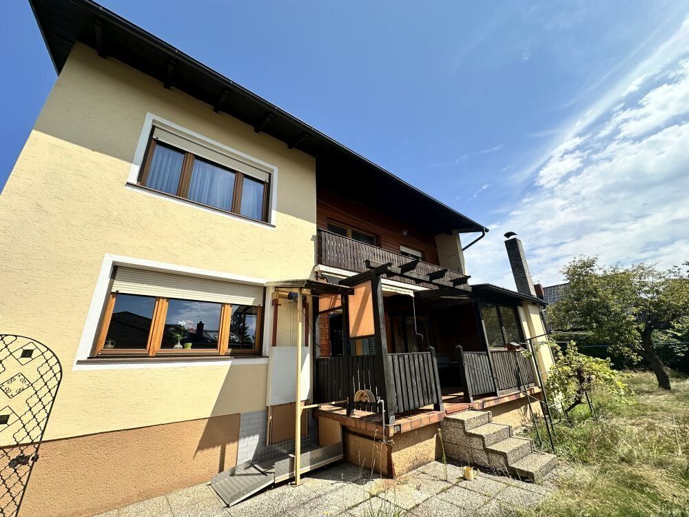 Idyllisches Mehrfamilienhaus mit rd. 516 m² Garten, Terrasse und 3 Garagen in absoluter Ruhelage