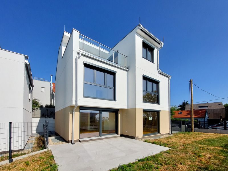 Wohnen beim Wein. Modernes Einzelhaus in Bestlage am Ölberg. Mit Tischlerküche und Klimaanlage. Bezugsfertig