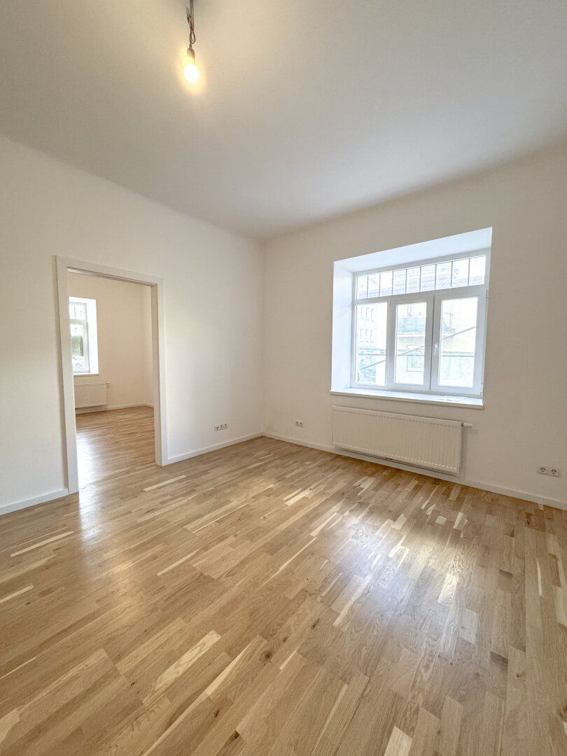 Stilvolle Altbauwohnung - Erstbezug mit modernem Komfort in zentraler Lage!