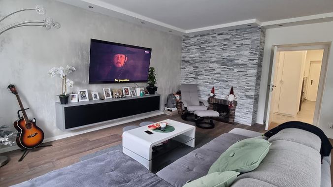 Mohsgasse Couchgarnitur mit offenem Kamin bzw. Fernsehwand