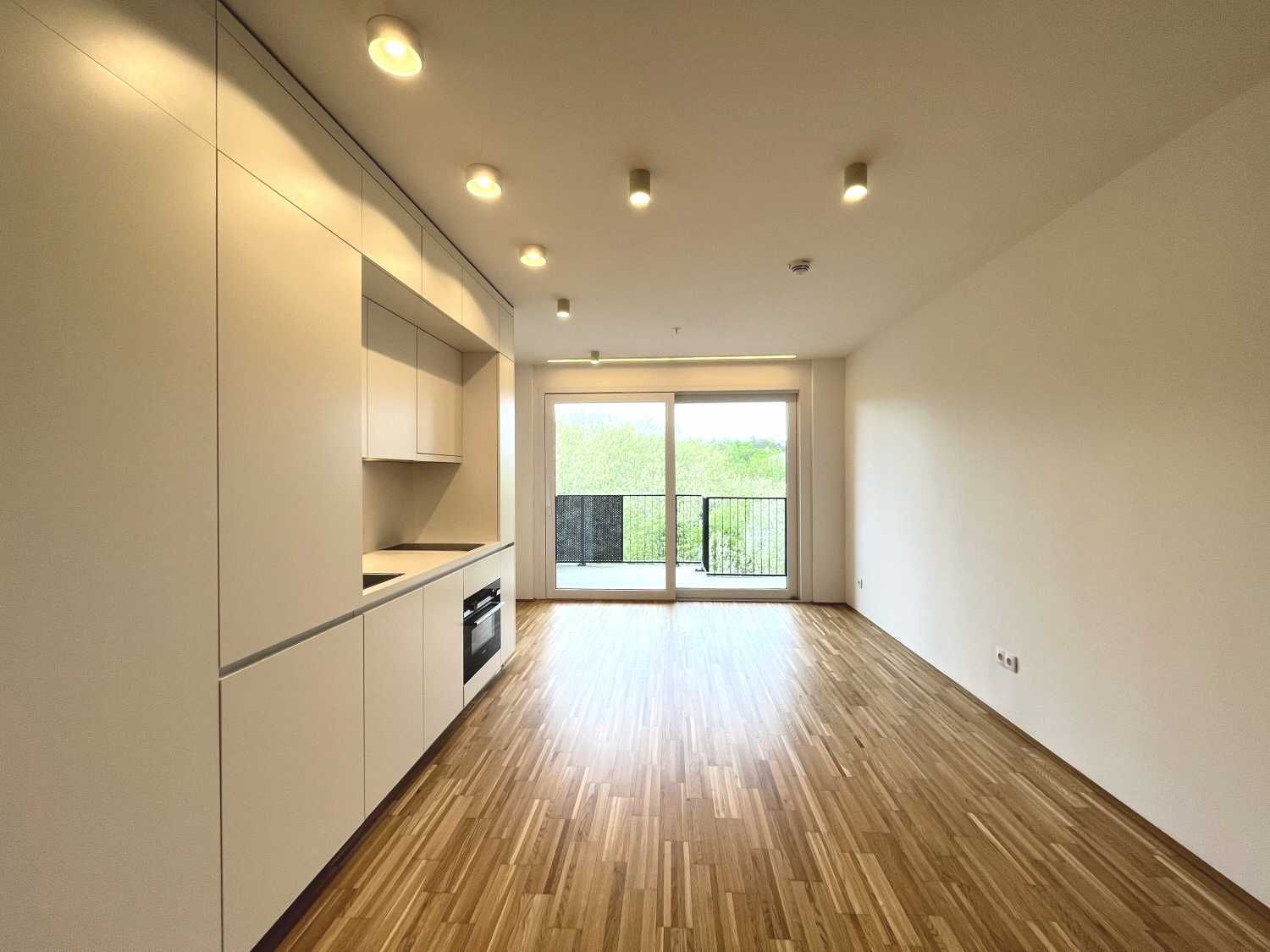 Wohnen im Grünen - Moderne Garconniere mit Parkblick und Fitnessraum!