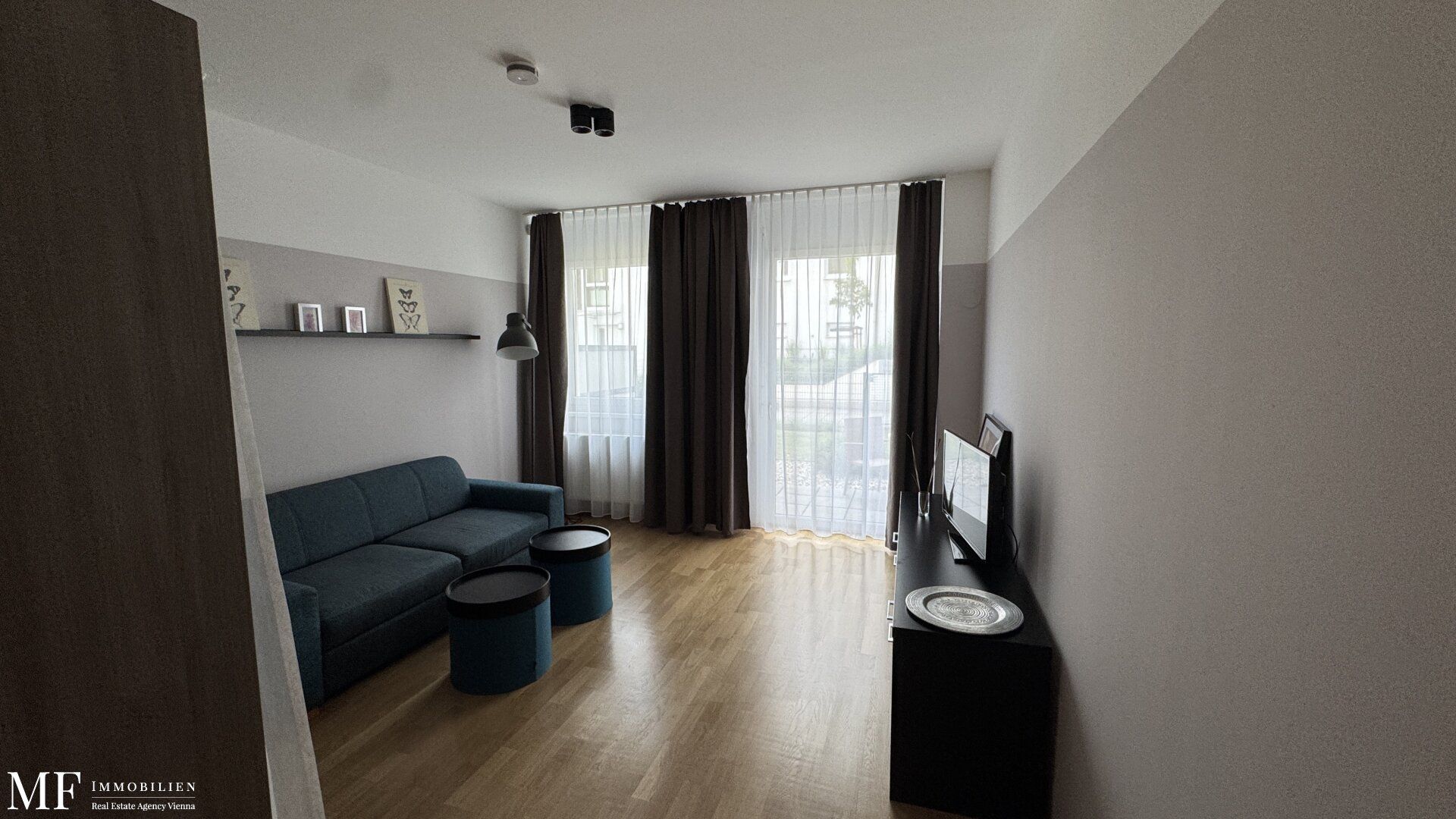 Neuwertige 1-Zimmer-Wohnung mit Garten und Terrasse, möbliert
