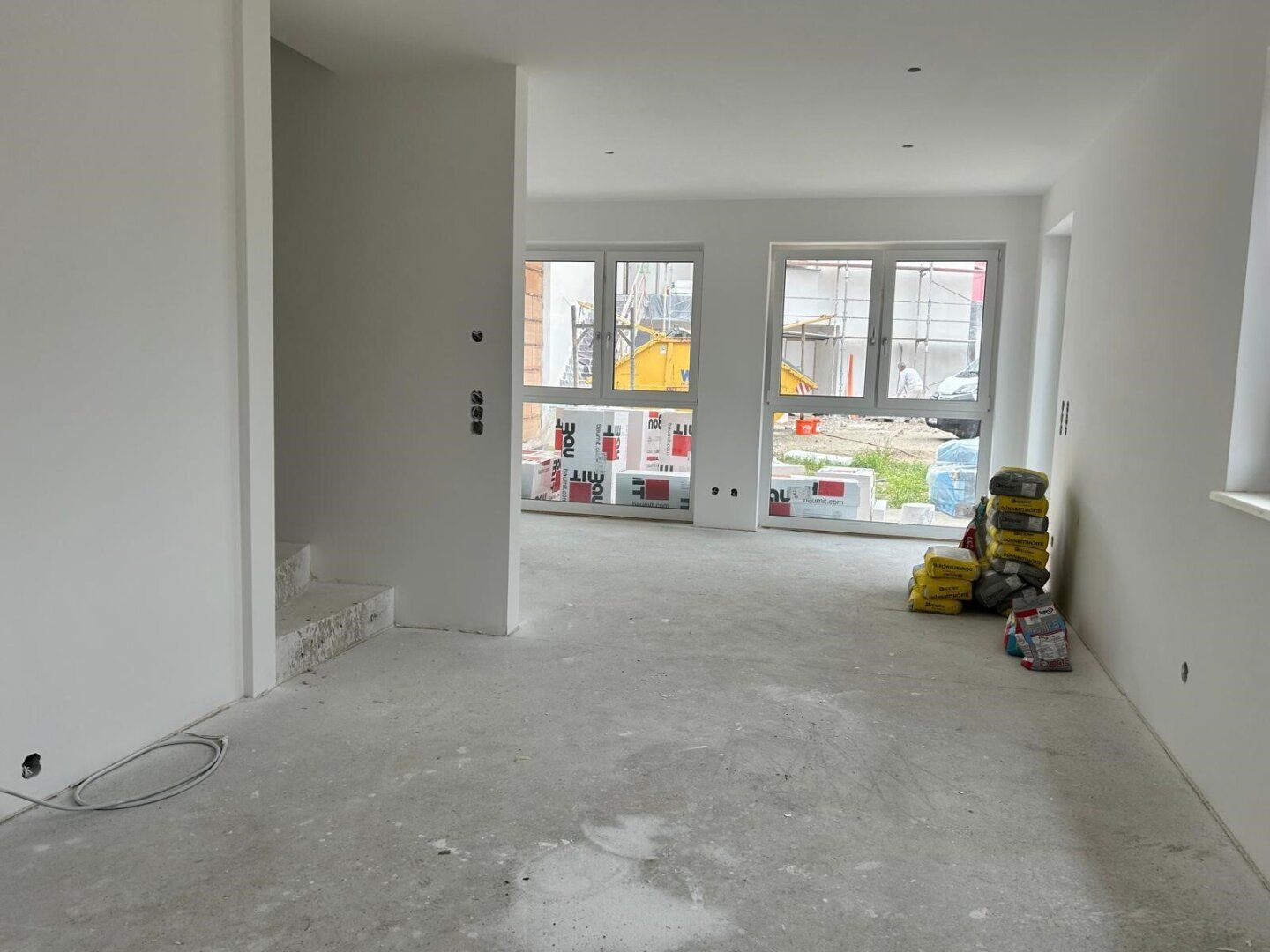 Moderne Gartenwohnung in St. Marien: Erstbezug mit Terrasse und 2 Stellplätzen zur Miete!