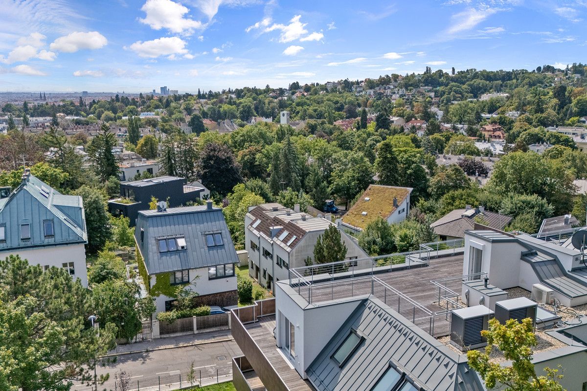 DG-Wohnung mit atemberaubender Dachterrasse in absoluter Grünruhelage