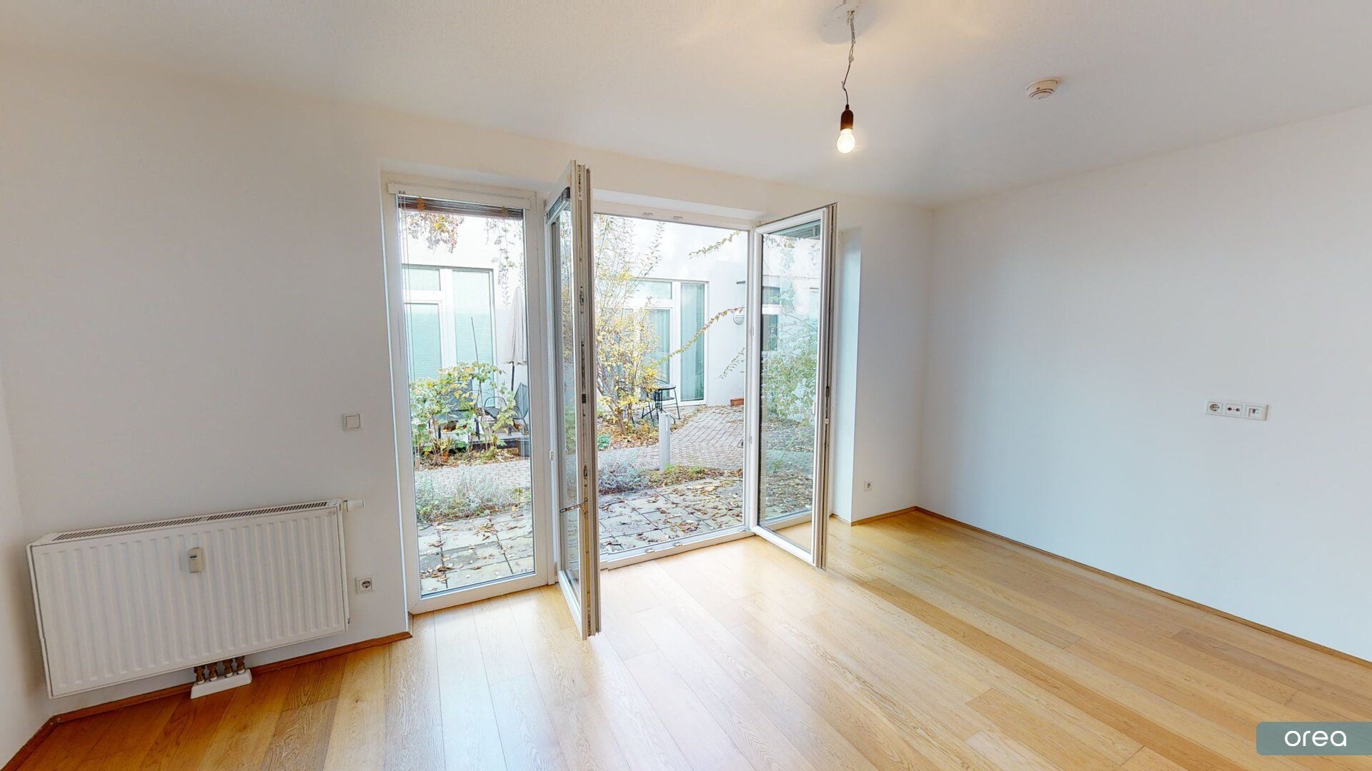orea | Gemütliche 2-Zimmer-Wohnung mit Terrasse im ruhigen Innenhof | Smart besichtigen · Online anmieten