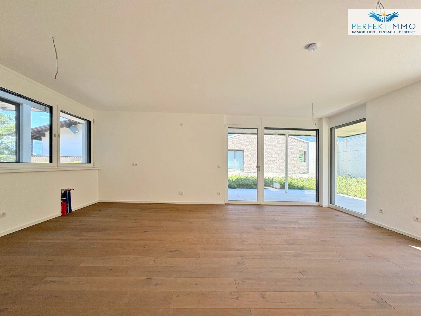 Erstklassiger Neubau: 3-Zimmer-Wohnung Top 1 mit Terrasse und Garten