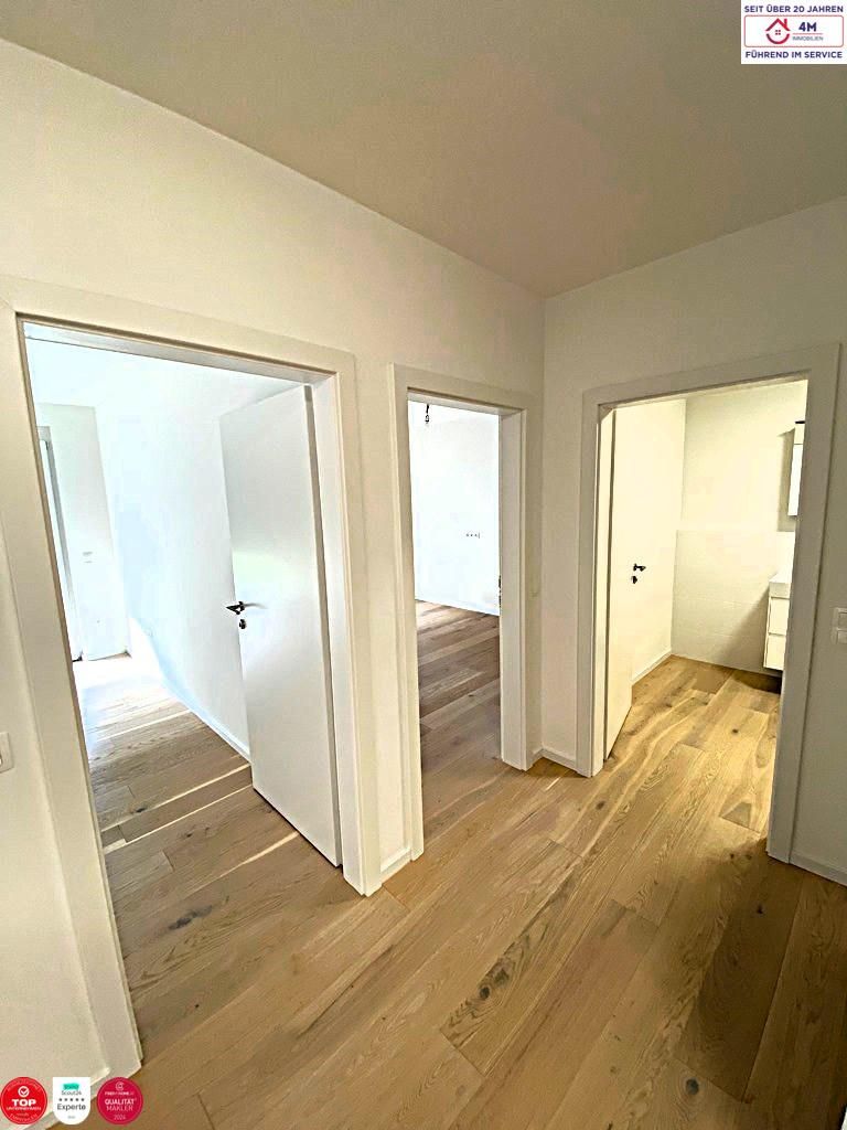Stylische Gartenwohnung mit Designküche & Tiefgarage - 3-Zimmer-Neubau mit Westterrasse