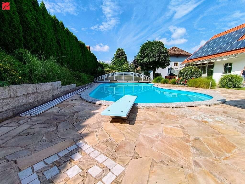 Design trifft Genuss: Premiumwohnen mit Pool, Sauna & Weinkeller