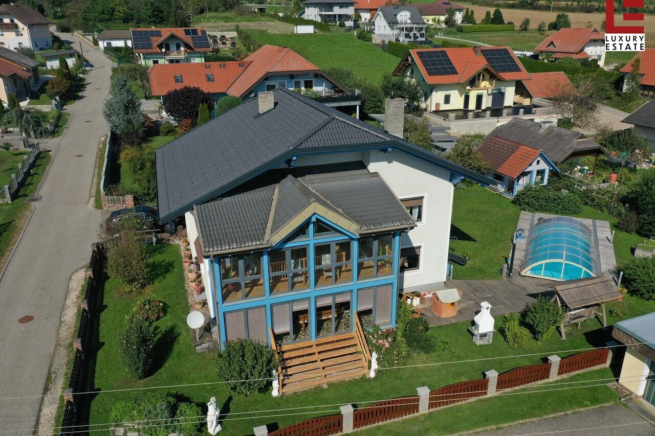 2-Familienhaus in Klagenfurt Land mit Wintergarten & Pool