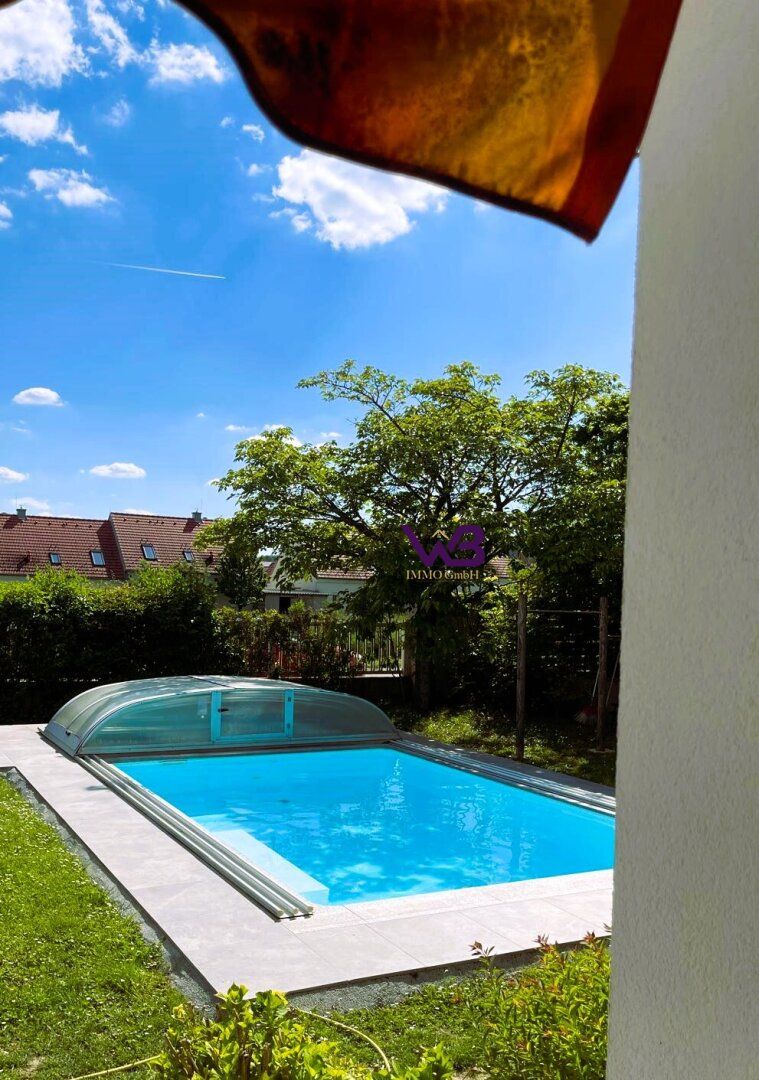 Großzügiges Einfamilienhaus mit Garage und Swimmingpool in einer begehrten Lage von Hagenbrunn!