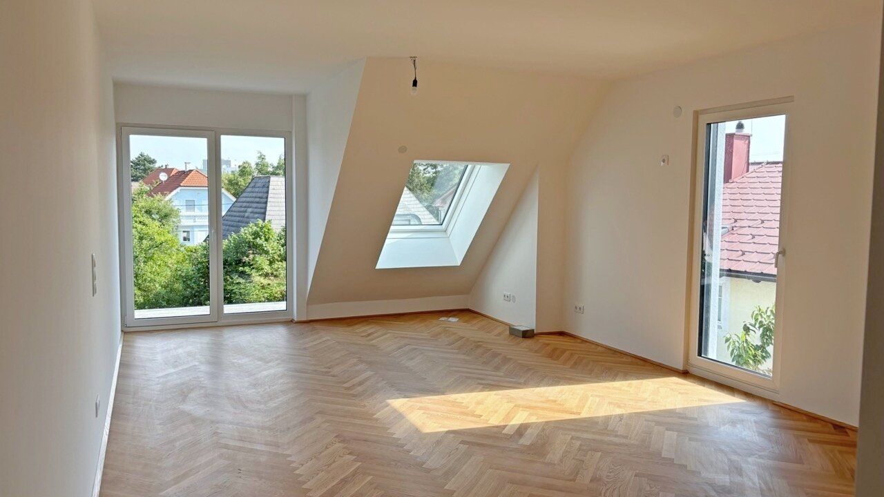 Moderne Architektur inmitten der Natur - Hochwertige Dachgeschoss 3-Zimmer Wohnung mit Balkon!