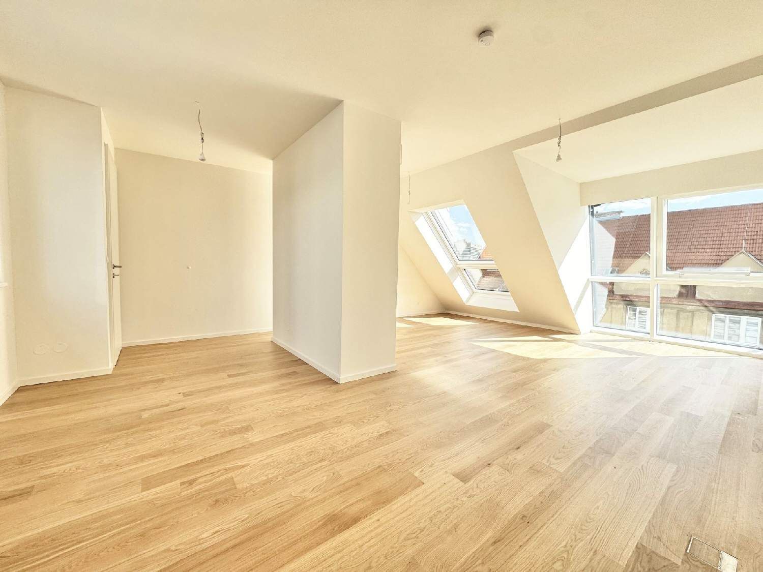 Eleganz trifft Lage - Neubau-Dachgeschosswohnung in Toplage