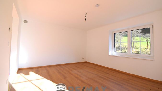 Wohnbereich mit Ausgang auf den Balkon, An