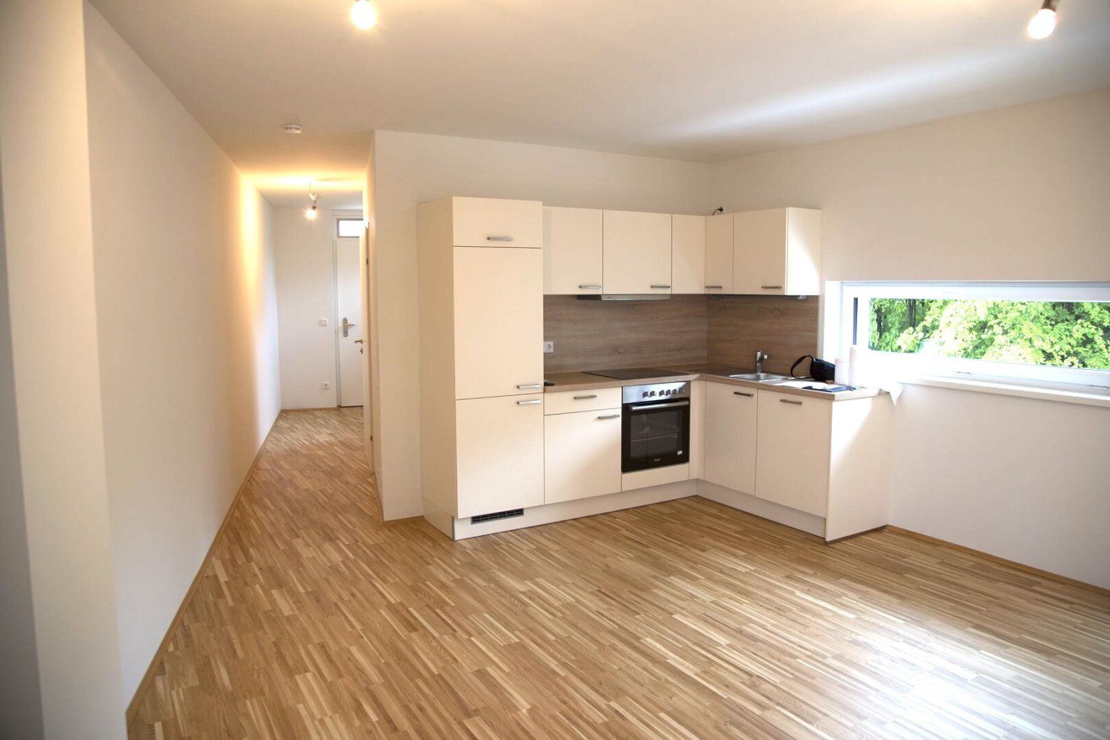 PROVISIONSFREIE Neubau 3-Zimmer-Balkonwohnung südseitig ausgerichtet mit Tiefgaragenparkplatz und herrlicher Terrasse
