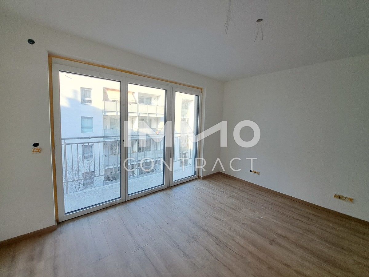 2 Zimmer mit Balkon, Erdwärme und Solaranlage. Ruhige Hoflage. 2023 erbaut.