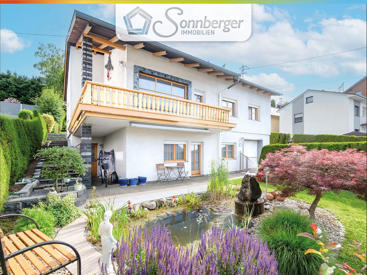 GARTENDUETT - Einfamilienhaus mit Einliegerwohnung und großem Garten in Mauthausen