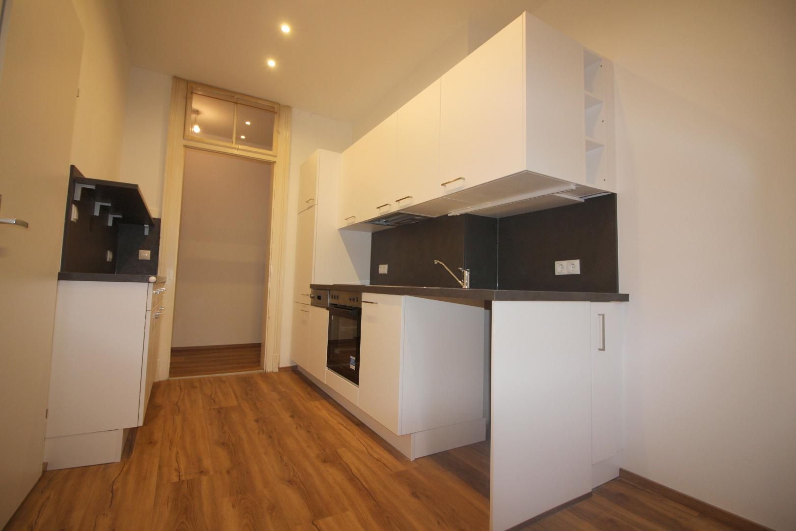 CHARMANTE 2-ZIMMER-WOHNUNG MIT EXTRA KÜCHE IN ZENTRUMSNÄHE