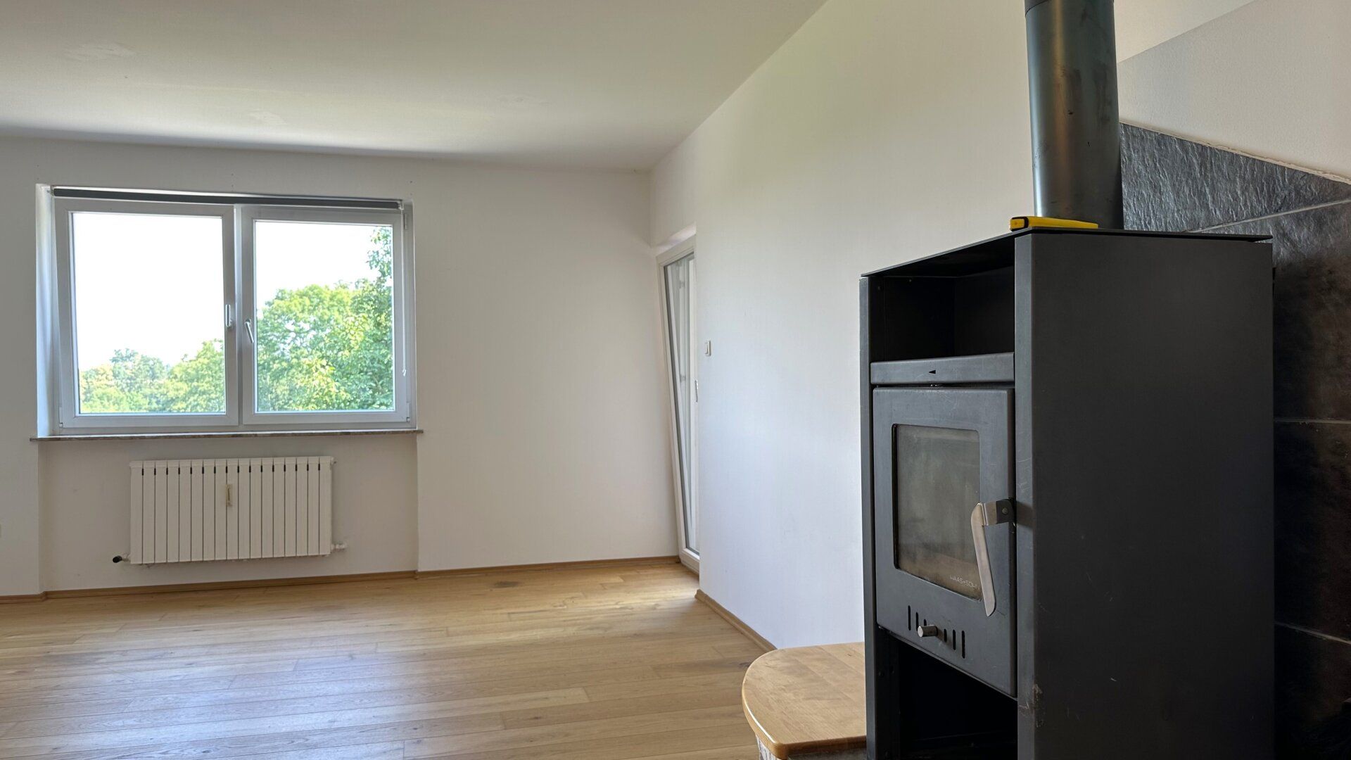 Bestbieterverfahren - Wohnung mit Holzofen und Eigengarten