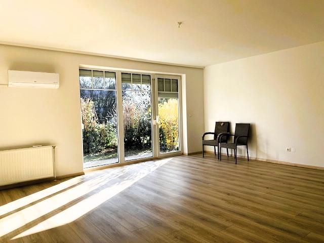 Grüne Oase in Kliniknähe - Erdgeschosswohnung wie neu, mit Carport & Garten!