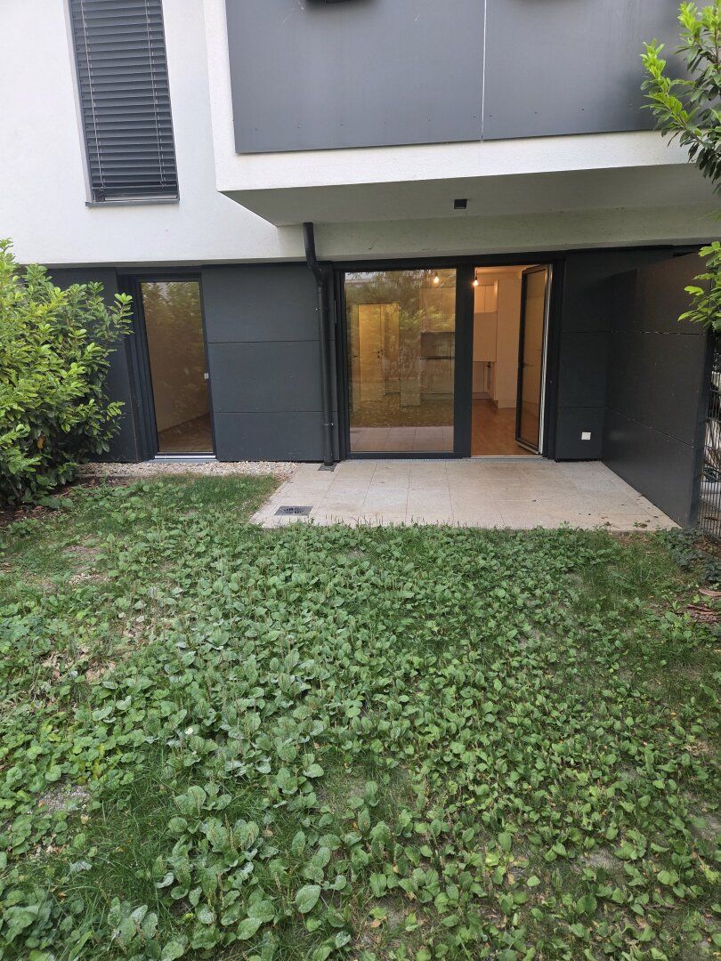 RUHIGE GARTENWOHNUNG,PERFEKTE ÖFFENTLICHE ANBINDUNG MIT TERRASSE INKLUSIVE KÜCHE