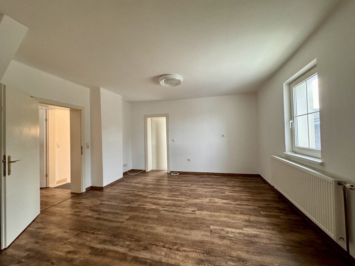 Dachgeschoss trifft Design - wohnen im Herzen von Pettenbach.