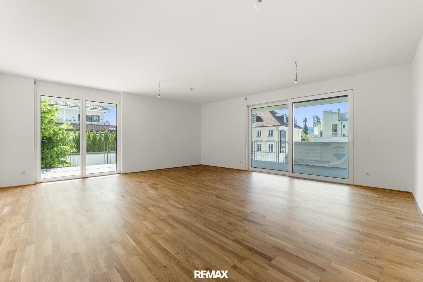 Moderne Praxisfläche nahe dem Wörthersee: Erstbezug, barrierefrei & mit XL-Terrasse - Ansicht 2