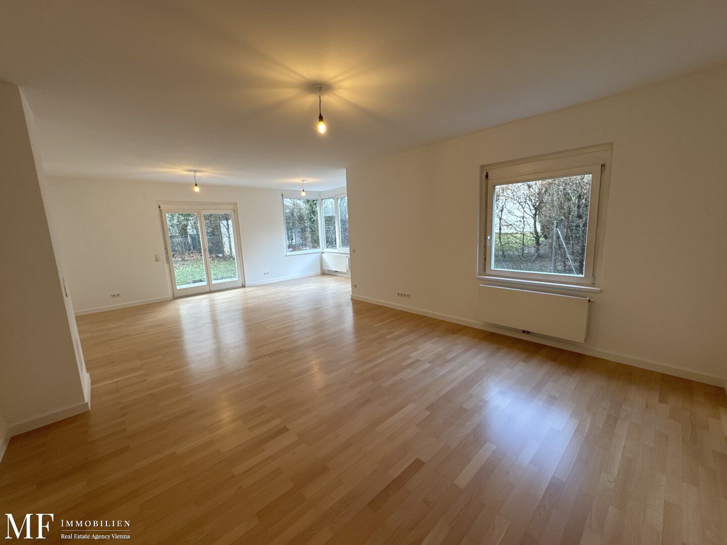 Stilvolles Wohnen mit Garten und Terrasse in exklusiver Lage