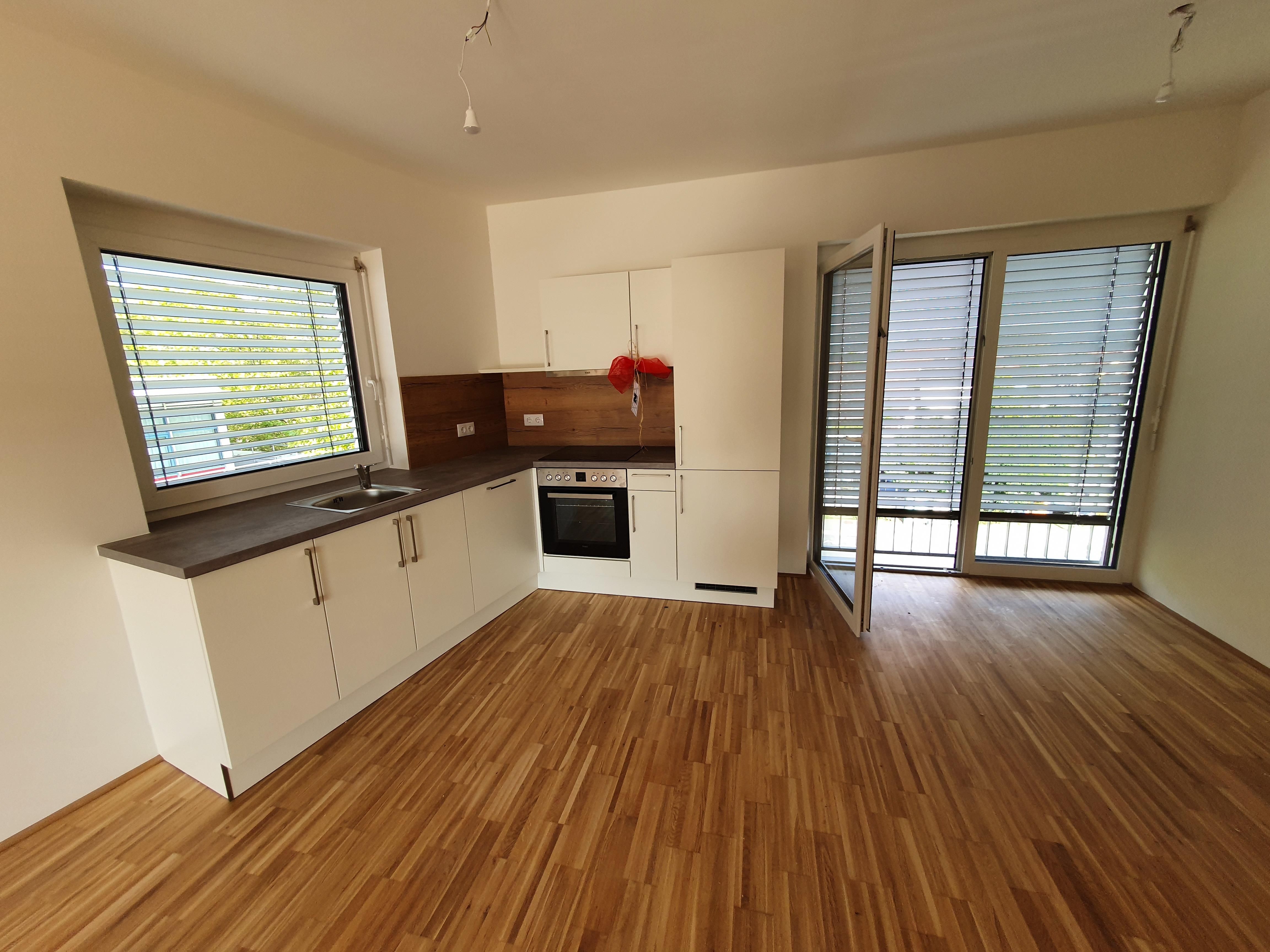 Sehr helle 2-Zimmer-Wohnung mit überdachter Terrasse