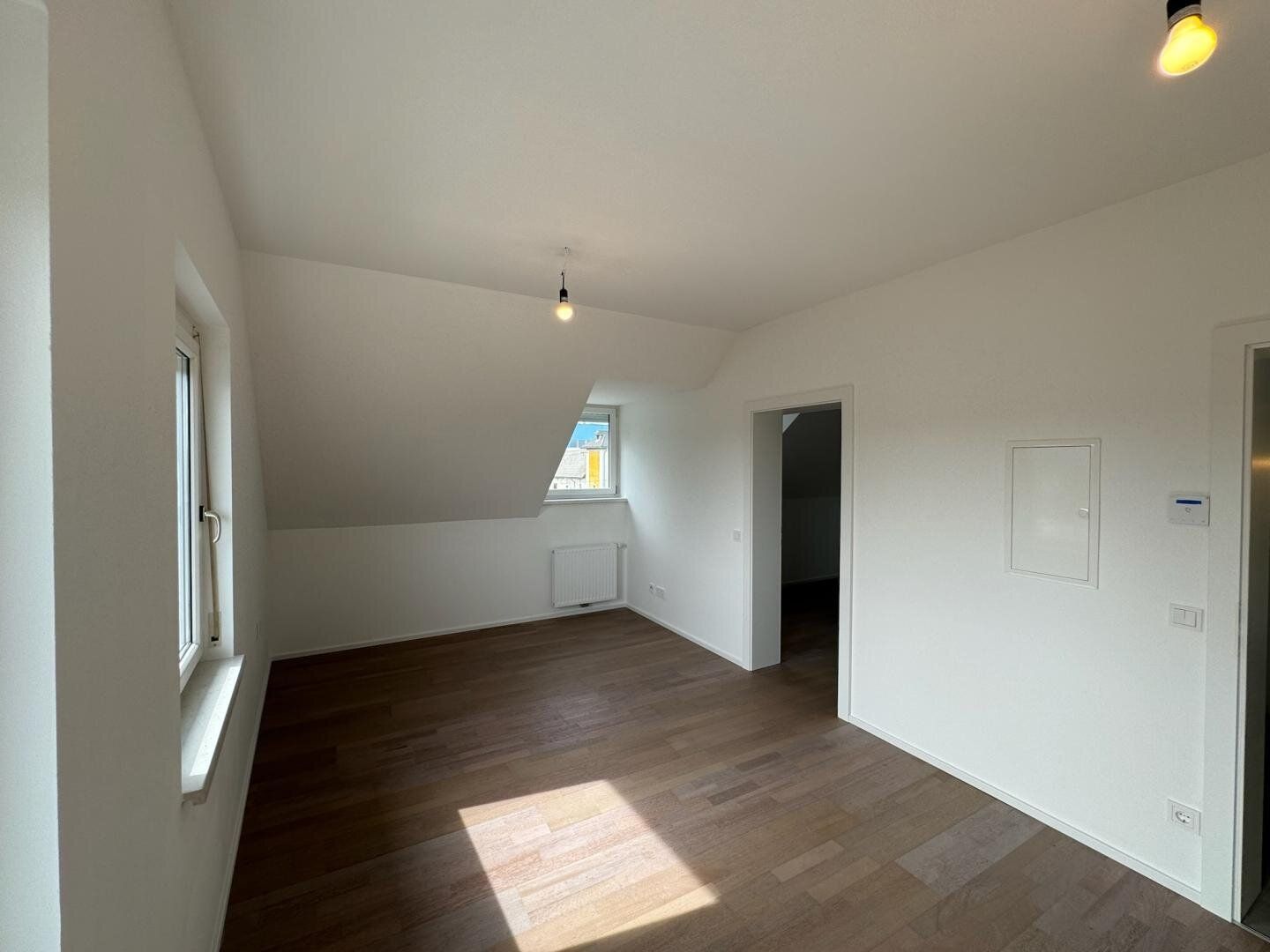 Top 2 - Gemütliche 2-Zimmer-Dachgeschosswohnung mit Blick auf den Grünberg und Traunstein