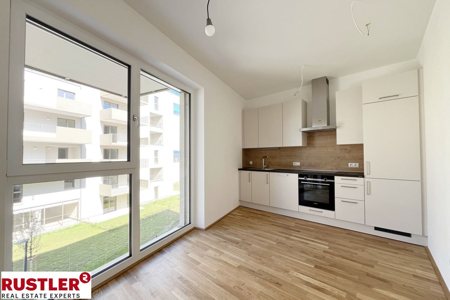 ERSTBEZUG I Wohnen im Grünen - exklusive 1-Zimmer-Wohnung mit Balkon und moderner Ausstattung