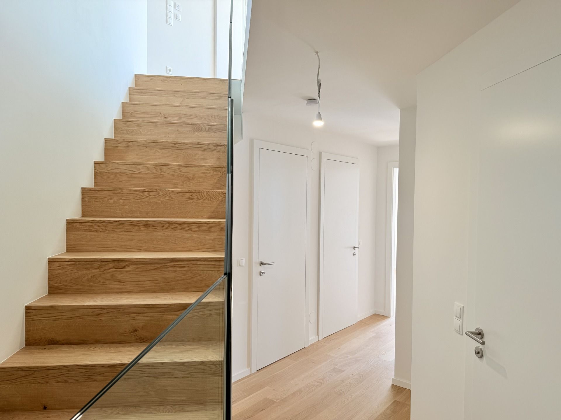 Eleganz trifft Lage - Neubau-Dachgeschosswohnung in Toplage