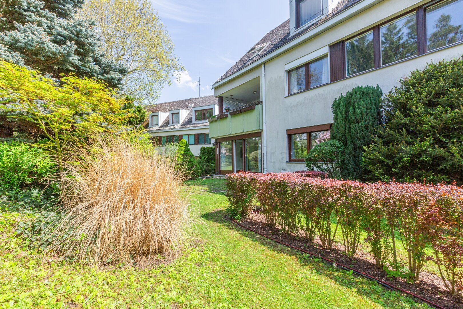 Himmelhof: Splitlevel-Gartenwohnung in traumhafter Grünruhelage von Ober St.-Veit