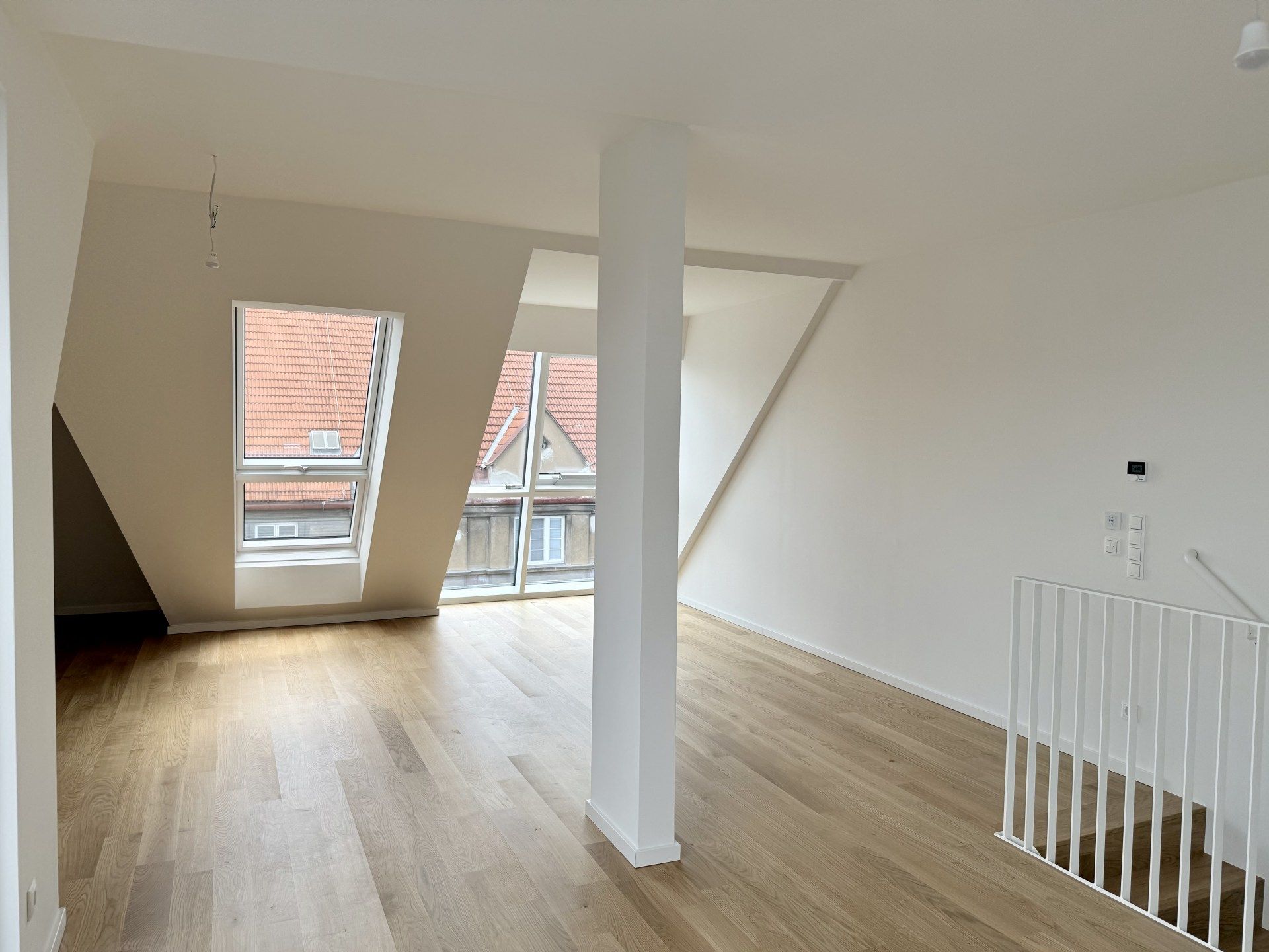 Eleganz trifft Lage - Neubau-Dachgeschosswohnung in Toplage