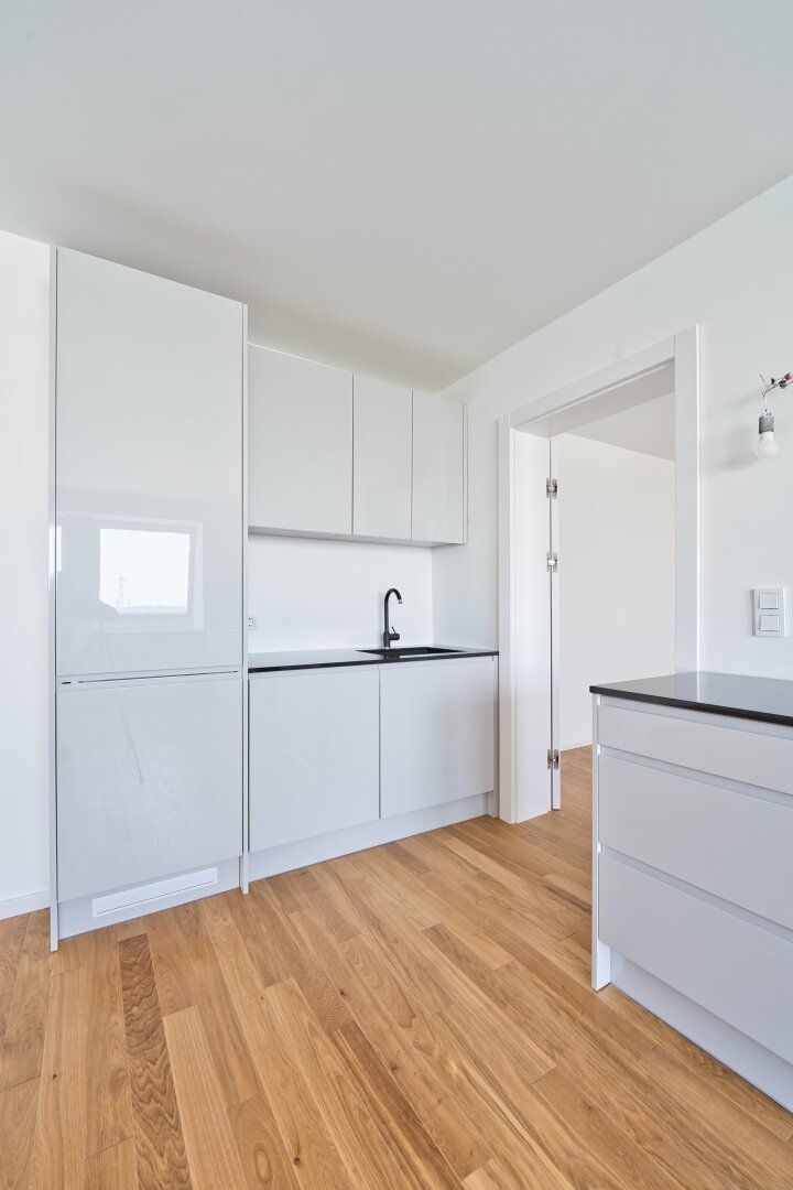 Erstbezug: Traumhafte 4-Zi-Wohnung DG mit Garten in 1110 Wien - nur 345.000 €!