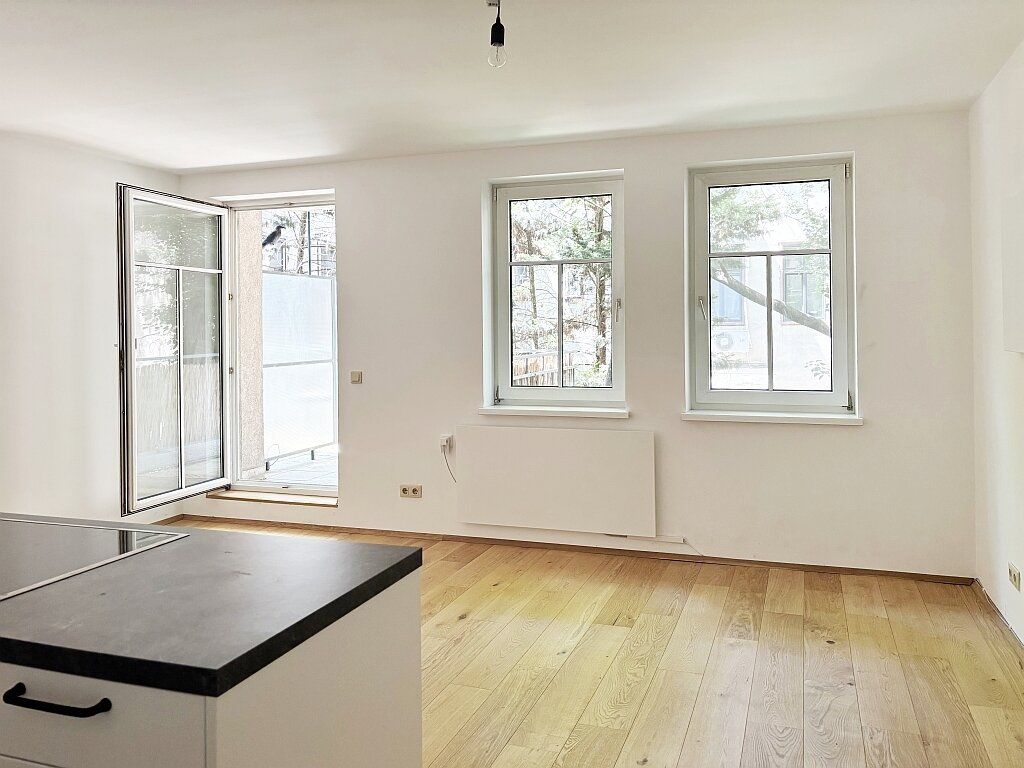 Terrasse zum begrünten Innenhof + perfekte Anbindung!