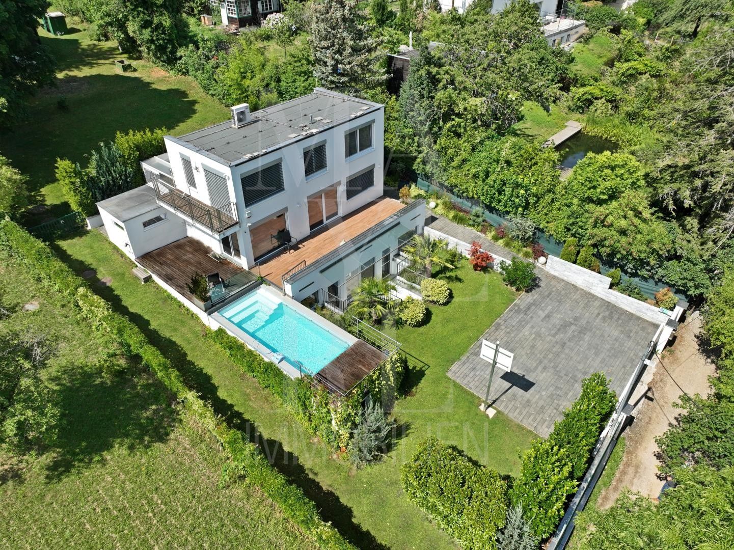 *PROVISIONSFREI* - Modernes Haus mit Pool und Autoabstellplätze in absoluter Grünruhelage und WIENBLICK