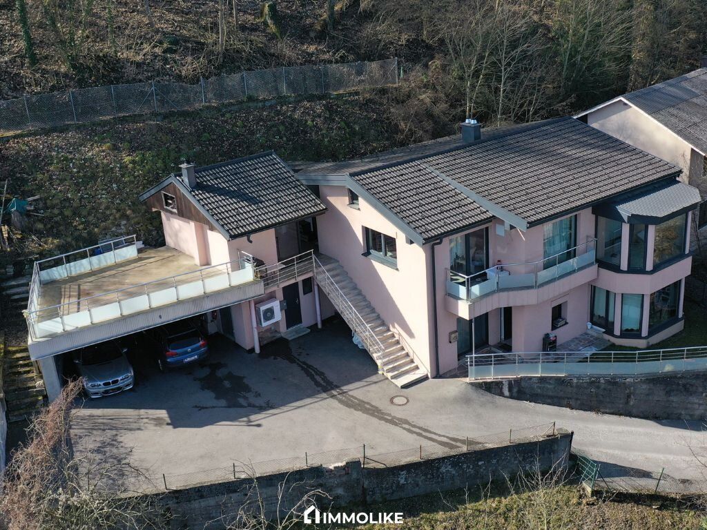 Ein Haus, zwei Wohnungen, fantastische Aussicht - großzugiges ZFH in Thalheim bei Wels.