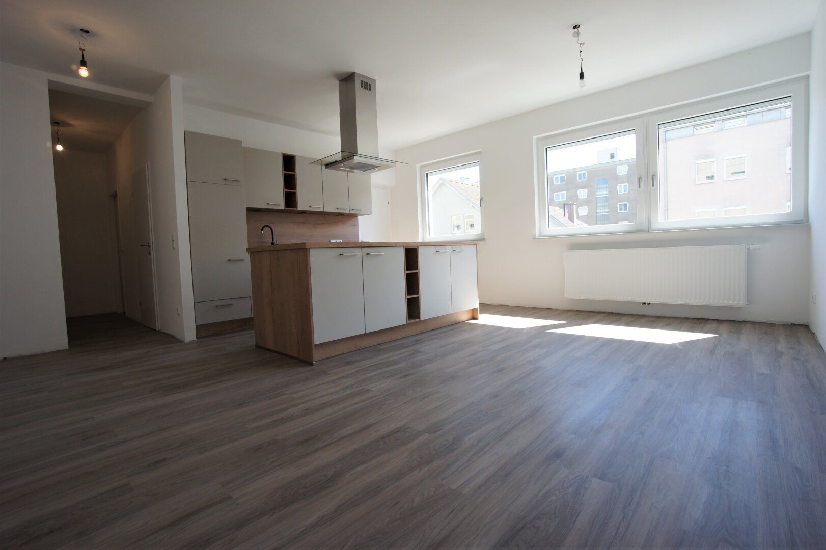 Ruhige und zentrale 58 m²-Wohnung mit Wohnküche - neuwertiger Zustand
