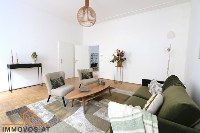 Tauchen Sie ins pulsierende Stadtleben ein! 4-Zimmer-Altbau mit Balkon an der Grenze 7./8 im 2. Lift-Stock