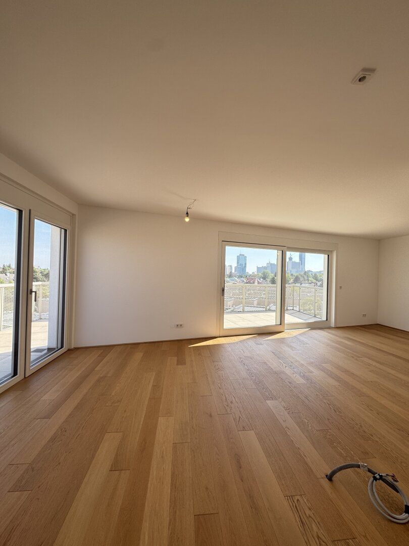 LUXURIÖSER ERSTBEZUG MIT TRAUMTERRASSE - 3-ZIMMER-DACHGESCHOSSWOHNUNG IN 1210 WIEN